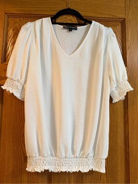 Wantable White V-Neck Puff Sleeve Smocked Blouse